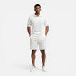 Men's breathable summer knit polo shorts set by FJØRNA, featuring a structured design and comfortable fit for warm weather.