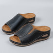 FJØRNA orthopedic wedge open-toe slide sandals for women, featuring a comfortable design and stylish open-toe style.