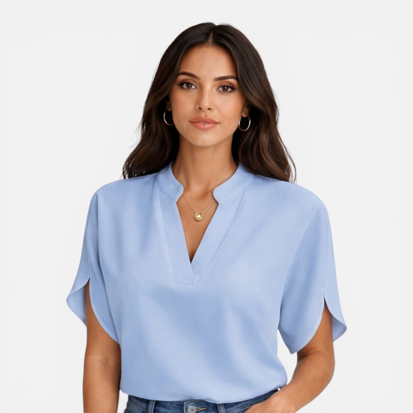 Lightweight women's chiffon V-neck blouse from FJØRNA, perfect for casual summer wear, featuring a flowy, airy design.