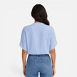 Lightweight women's chiffon blouse with V-neck, casual summer top by FJØRNA, featuring flowing fabric and relaxed fit.