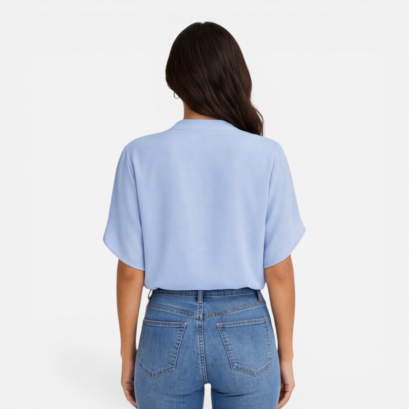 Lightweight women's chiffon blouse with V-neck, casual summer top by FJØRNA, featuring flowing fabric and relaxed fit.