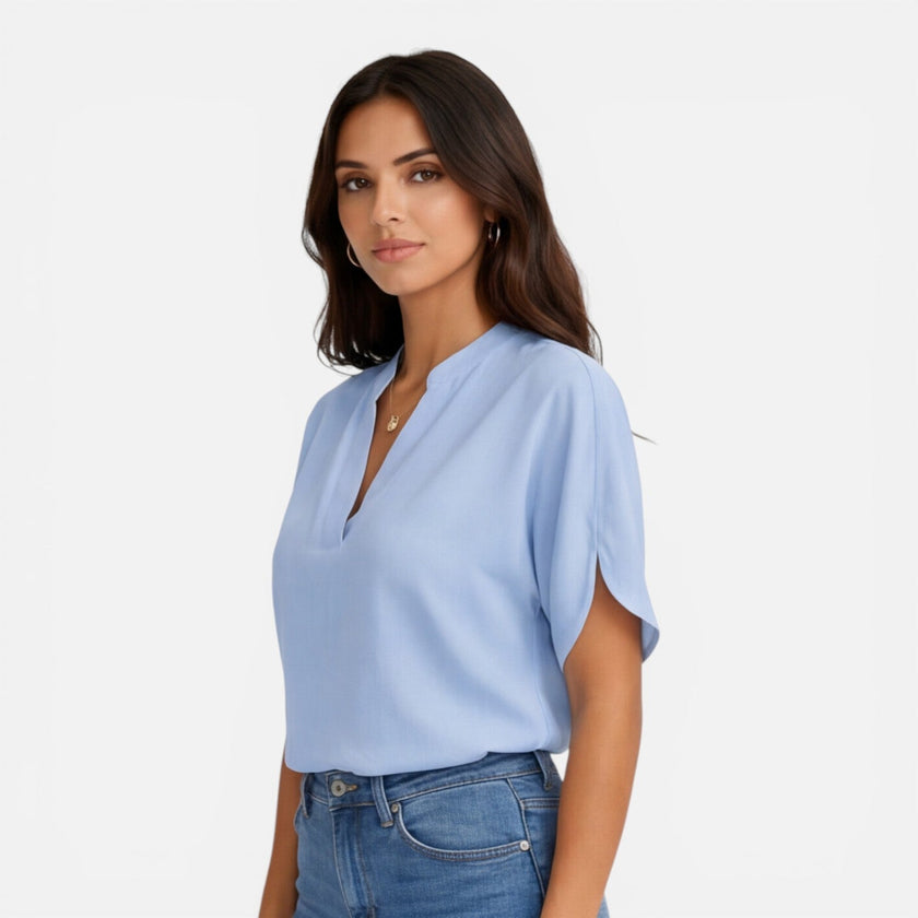 Lightweight women's chiffon blouse with V-neck from FJØRNA, perfect for summer casual wear, featuring a flowy, breezy design.