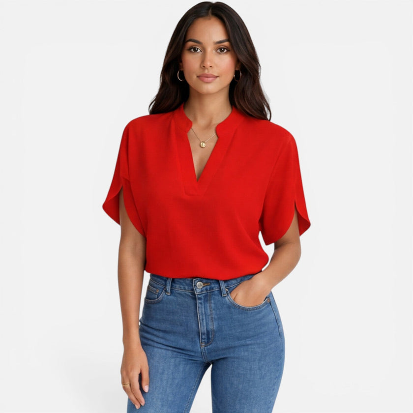 Women's lightweight chiffon V-neck summer blouse by FJØRNA, casual and breezy, shown in a relaxed fit on a model.