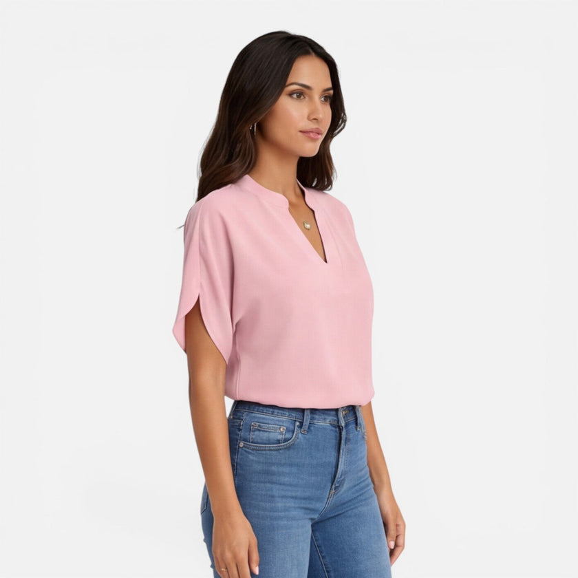 Lightweight women's chiffon V-neck blouse by FJØRNA, perfect for summer casual wear, featuring a flowy, airy design.