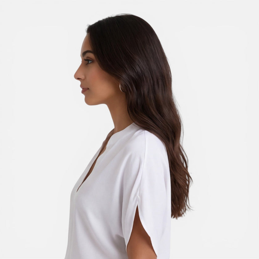 Lightweight women's chiffon blouse with V-neck by FJØRNA, perfect for casual summer wear, featuring a flowy and airy design.