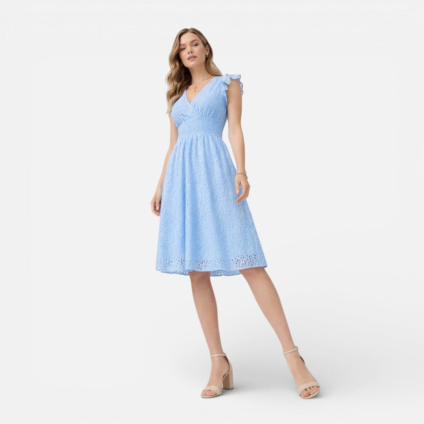 Women's elegant summer midi dress by FJØRNA, featuring cotton lace fabric, ideal for wedding guests and warm-weather occasions.