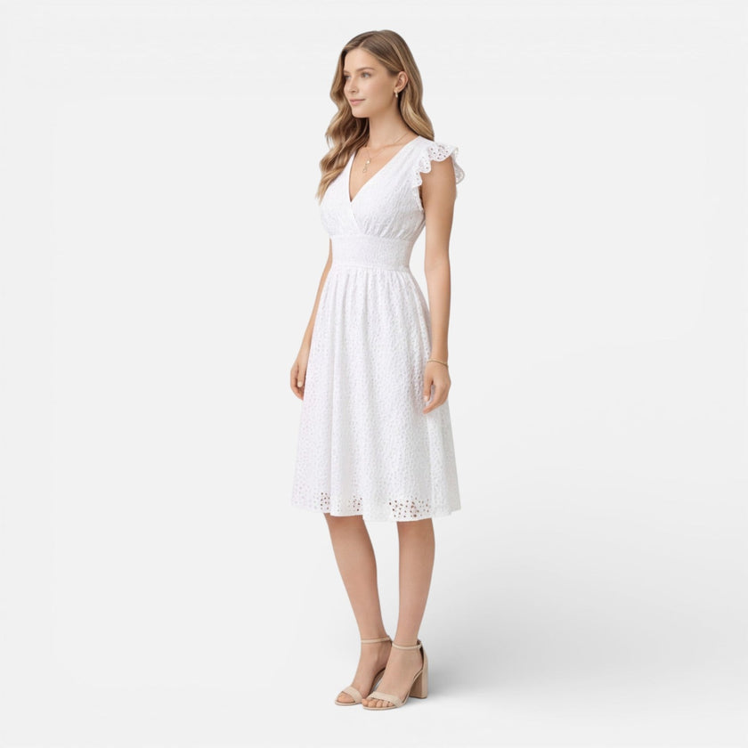Women's elegant summer midi dress by FJØRNA featuring cotton lace fabric, perfect for wedding guest occasions.