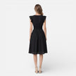 Women's elegant summer midi dress by FJØRNA featuring cotton lace fabric, perfect for wedding guest attire.