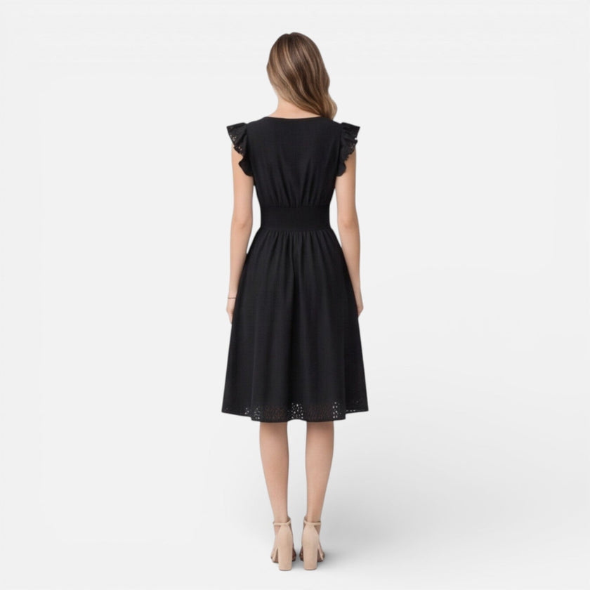 Women's elegant summer midi dress by FJØRNA featuring cotton lace fabric, perfect for wedding guest attire.
