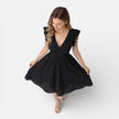 Elegant women's summer midi dress by FJØRNA featuring cotton lace fabric, perfect for wedding guest attire.