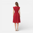 Women's elegant summer midi dress by FJØRNA featuring cotton lace fabric, perfect for wedding guests and warm-weather occasions.