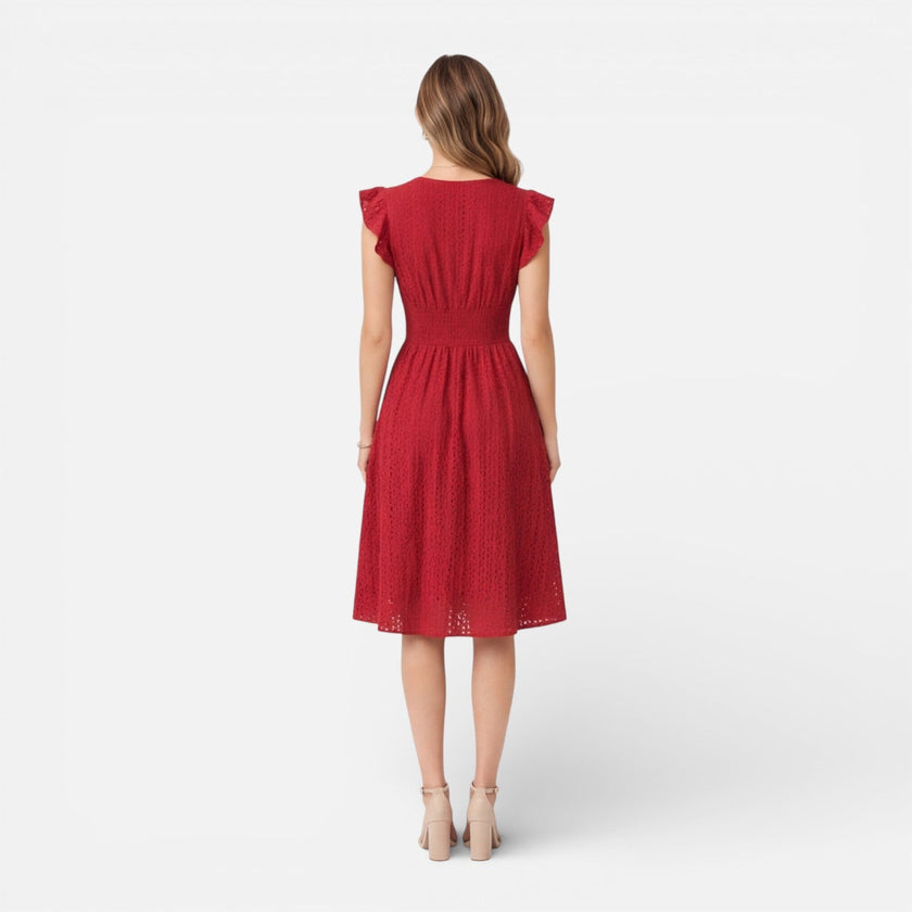 Women's elegant summer midi dress by FJØRNA featuring cotton lace fabric, perfect for wedding guests and warm-weather occasions.