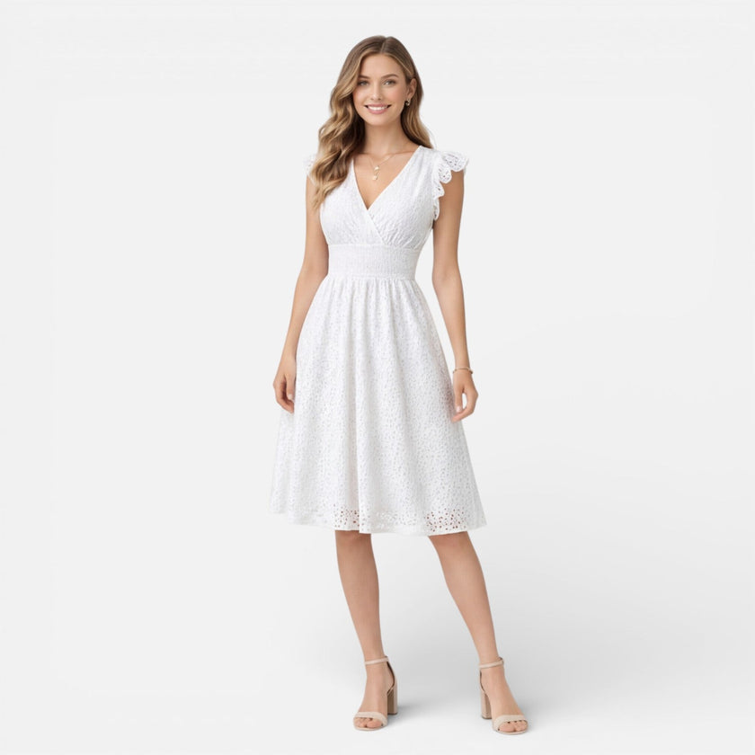 Women's elegant summer midi dress by FJØRNA featuring cotton lace fabric, perfect for wedding guest attire.