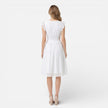 Elegant women's summer midi dress by FJØRNA featuring cotton lace, perfect for wedding guest attire and warm weather wear.
