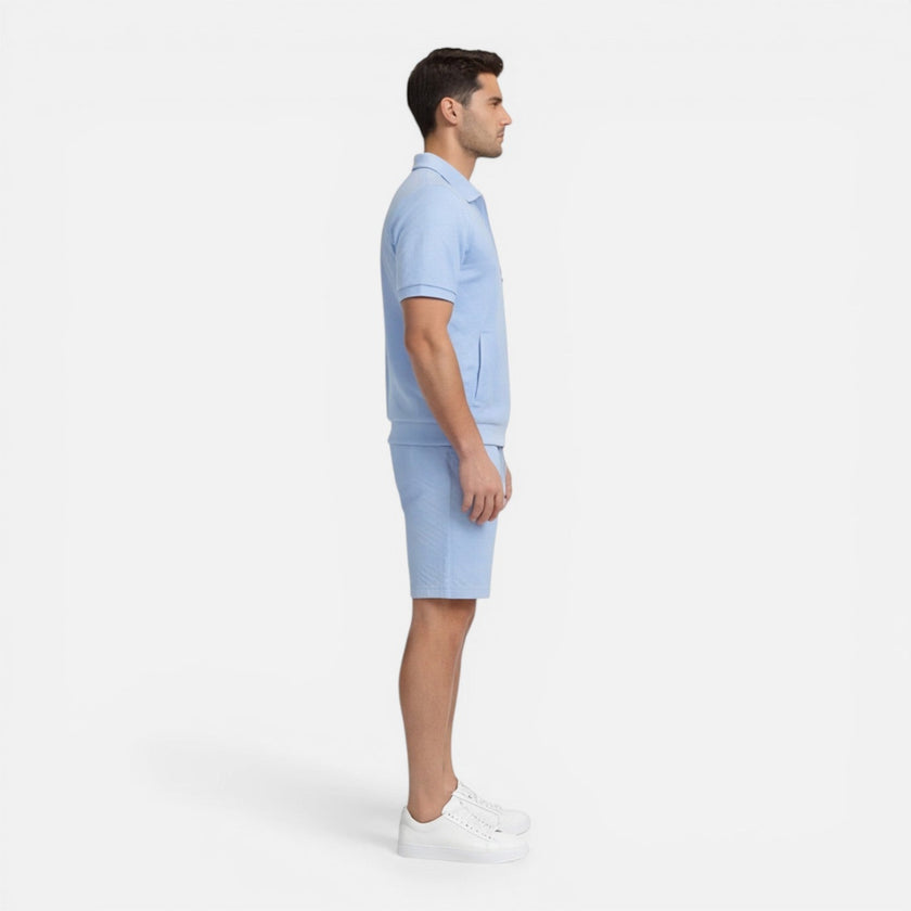 Men's summer matching set by FJØRNA featuring a zip shirt and drawstring shorts in a slim fit, ideal for warm weather.