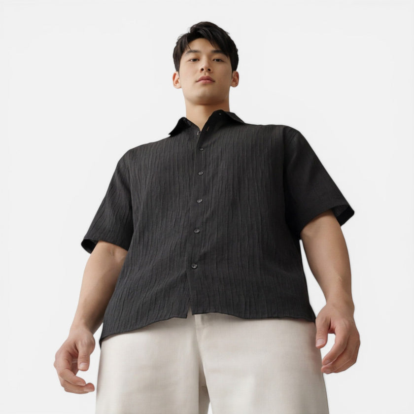 Men's lightweight Tencel short sleeve shirt by FJØRNA, designed for summer comfort, in a relaxed fit with natural fabric texture.