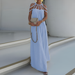 FJØRNA Luna White Dress with spaghetti straps, lightweight fabric, and flowy design, perfect for casual or summer wear.
