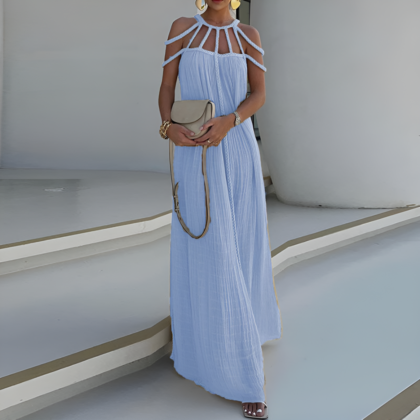 FJØRNA Luna White Dress with spaghetti straps, lightweight fabric, and flowy design, perfect for casual or summer wear.