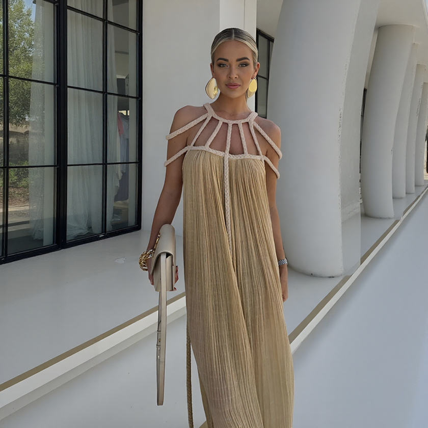 FJØRNA Luna White Dress with spaghetti straps, flowing fabric, and elegant design, perfect for summer or casual occasions.
