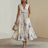 FJØRNA pleated belted A-line maxi dress for women, featuring a flowy silhouette and waist belt, stylish and comfortable for summer wear.
