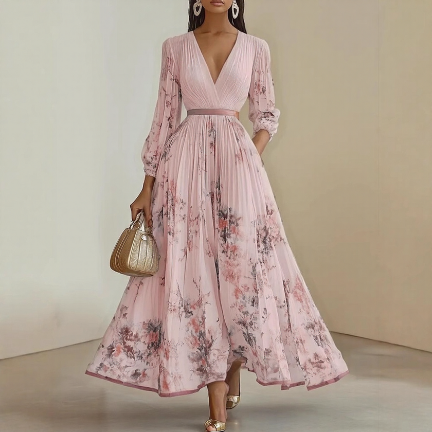 FJØRNA pleated belted A-line maxi dress for women, flowing fabric with a waist belt and elegant pleats, full-length image.