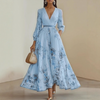 FJØRNA pleated belted A-line maxi dress for women, featuring a flowing silhouette and stylish waist belt, perfect for elegant occasions.