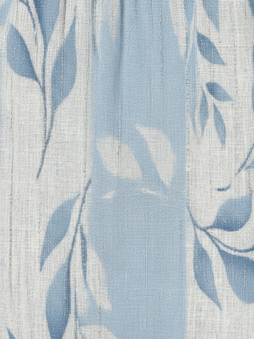 FJØRNA women's sleeveless summer midi dress with a flowy, lightweight fabric and blue leaf pattern, perfect for warm weather.