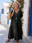FJØRNA women's summer maxi dress with short sleeves and ruffle details, tiered blue fabric perfect for warm weather wear.