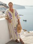 Floral V-neck summer maxi dress for women by FJØRNA featuring short sleeves and a flowing design, perfect for warm weather.