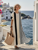 FJØRNA women's summer maxi dress with striped pattern, short sleeves, flowy fit, perfect for warm weather.