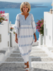 FJØRNA summer maxi dress for women with long sleeves, flowy fabric, and a relaxed fit, perfect for warm weather.