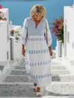 FJØRNA women's summer maxi dress with long sleeves, flowy fabric, perfect for warm weather and casual occasions.