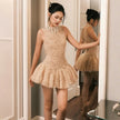 FJØRNA tulle back bow dress featuring a delicate tulle fabric and a stylish bow detail at the back.