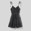 FJØRNA women's tulle mini dress, stylish party and day wear, featuring a delicate tulle fabric and a fitted silhouette.