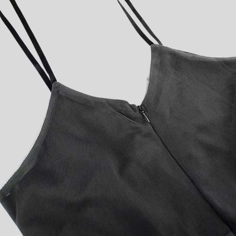 FJØRNA women's tulle mini dress featuring a stylish party and day style design, shown in a black, semi-sheer fabric with delicate detailing.