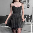 FJØRNA women's tulle mini dress with a delicate, semi-sheer design, perfect for party and daytime occasions.