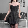 FJØRNA women's tulle mini dress with a delicate, semi-sheer design, perfect for party and daytime occasions.