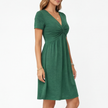 Women's comfortable cotton summer dress by FJØRNA featuring a V-neck and casual fit, perfect for warm weather.