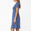 Women's comfortable cotton summer dress by FJØRNA featuring a V-neck and casual fit, shown in a lightweight, breezy fabric.