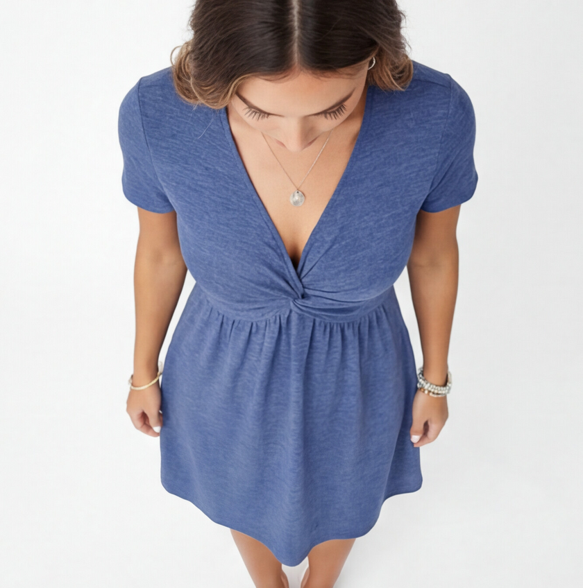 Women's FJØRNA cotton summer dress with V-neck, casual fit and twisted design, perfect for warm weather and everyday wear.