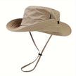 Unisex lightweight sun hat with wide brim and adjustable cord, designed for sun protection by FJØRNA.