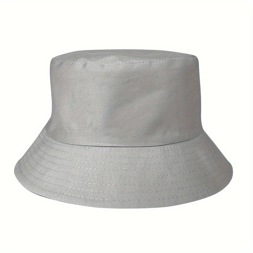 Unisex FJØRNA minimalist bucket hat with stitched brim, lightweight and versatile summer accessory for casual wear.