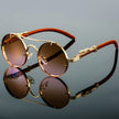 Unisex round retro sunglasses with double bridge frame from FJØRNA, featuring classic style and tinted lenses.