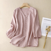 FJØRNA women's summer V-neck linen blouse featuring a light, breathable fabric and relaxed fit, perfect for warm weather.