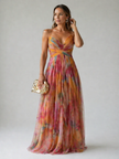 Flowy elegant women's evening dress by FJØRNA, featuring a graceful design perfect for formal occasions.