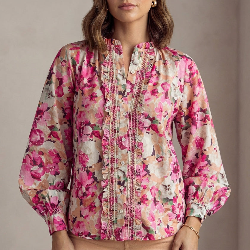 FJØRNA women's summer floral blouse with long sleeves and ruffle detailing, untucked, casual and stylish women's top.