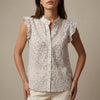 FJØRNA women's floral sleeveless summer blouse displayed untucked, lightweight and stylish for warm weather.