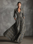 White tartan linen maxi dress by FJØRNA featuring a flared A-line skirt and sleeveless design, displayed from the front.