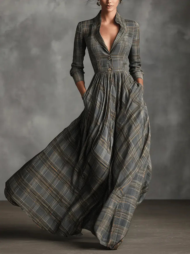 White tartan linen maxi dress with flared A-line skirt by FJØRNA, shown with flowing fabric and elegant design details.