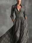 FJØRNA tartan linen maxi dress with flared A-line skirt and white color, featuring a relaxed fit and stylish design.